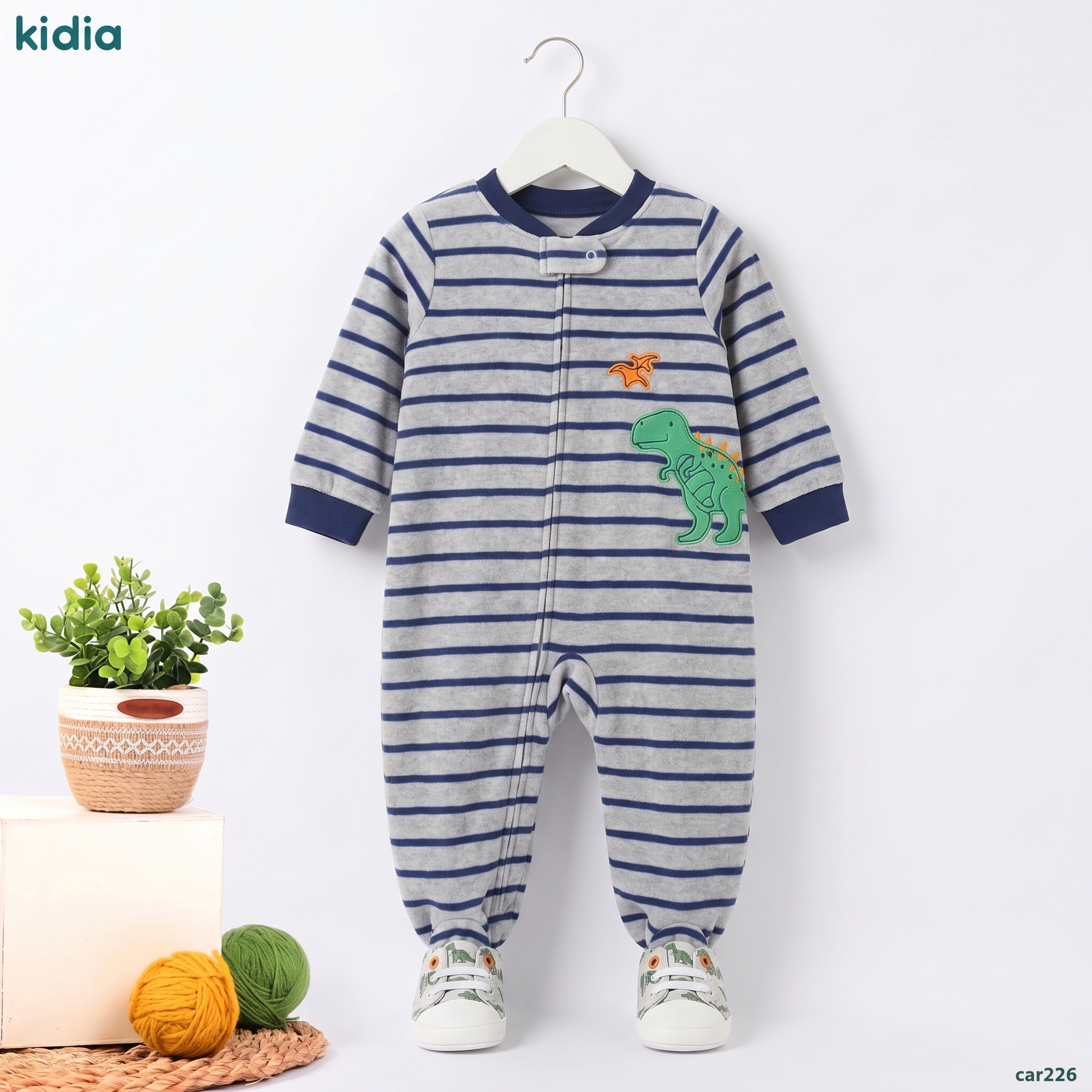 Baby_romper_with_dinosaur_hanging_2K_20260912165641