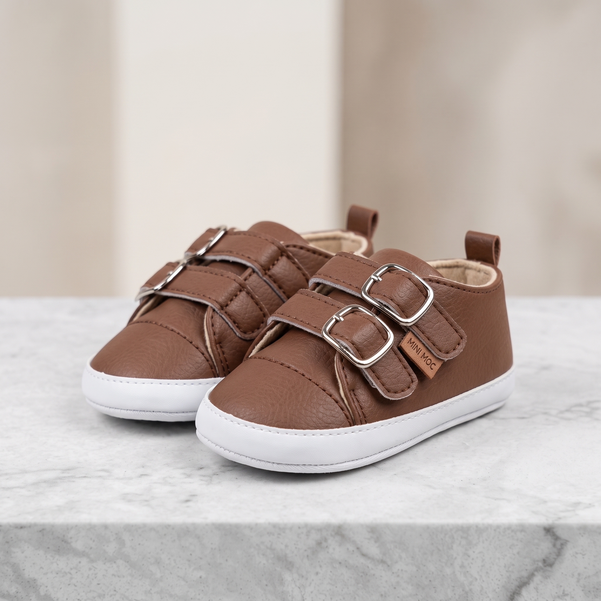 Brown_baby_shoes_displayed_2K_20260920120108