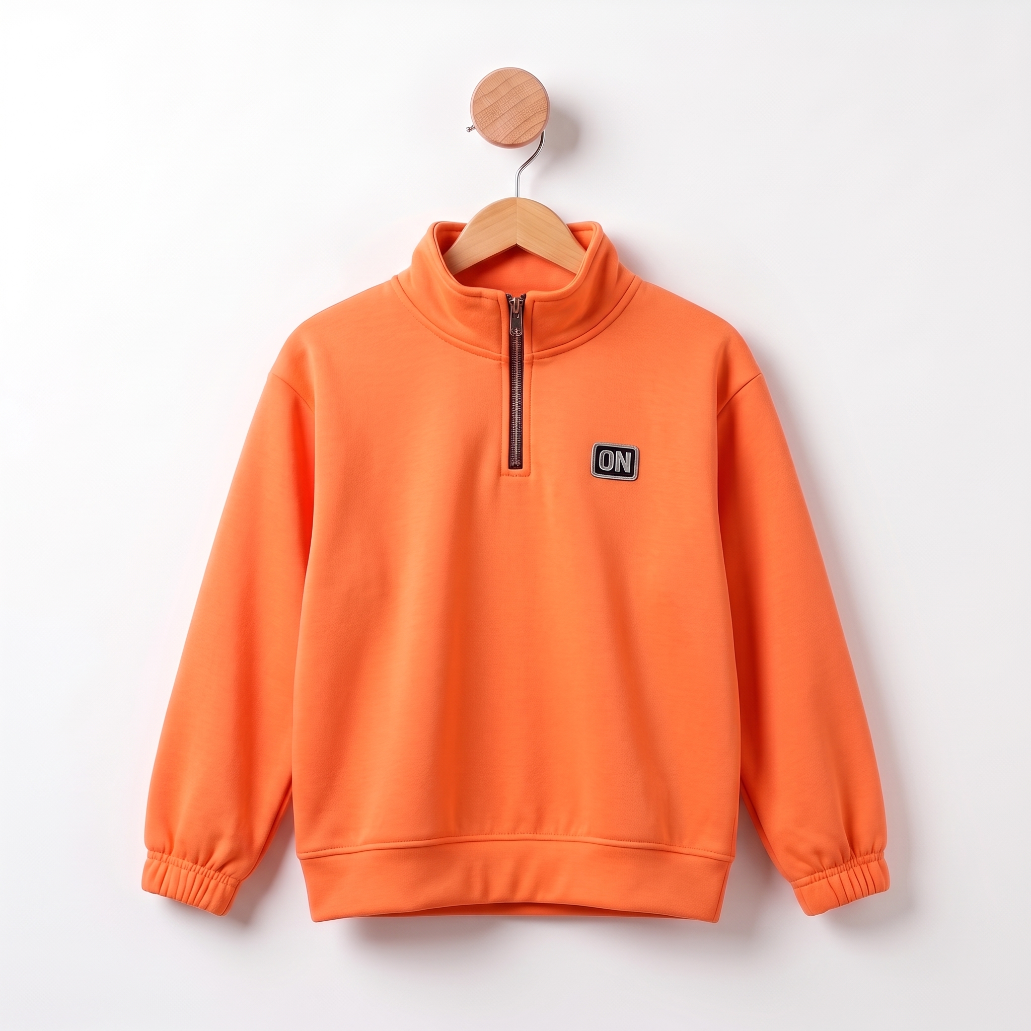 Orange_sweatshirt_hanging_on_hanger_1916eef0_2K