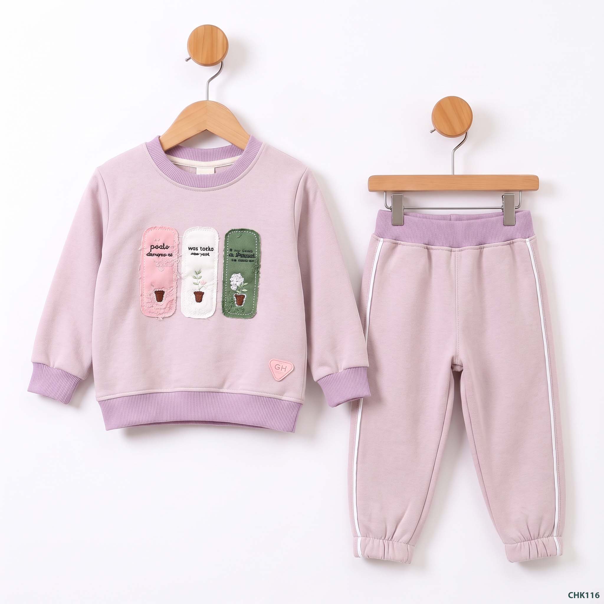 Pink_tracksuit_on_wooden_hangers_2K_20261023205854
