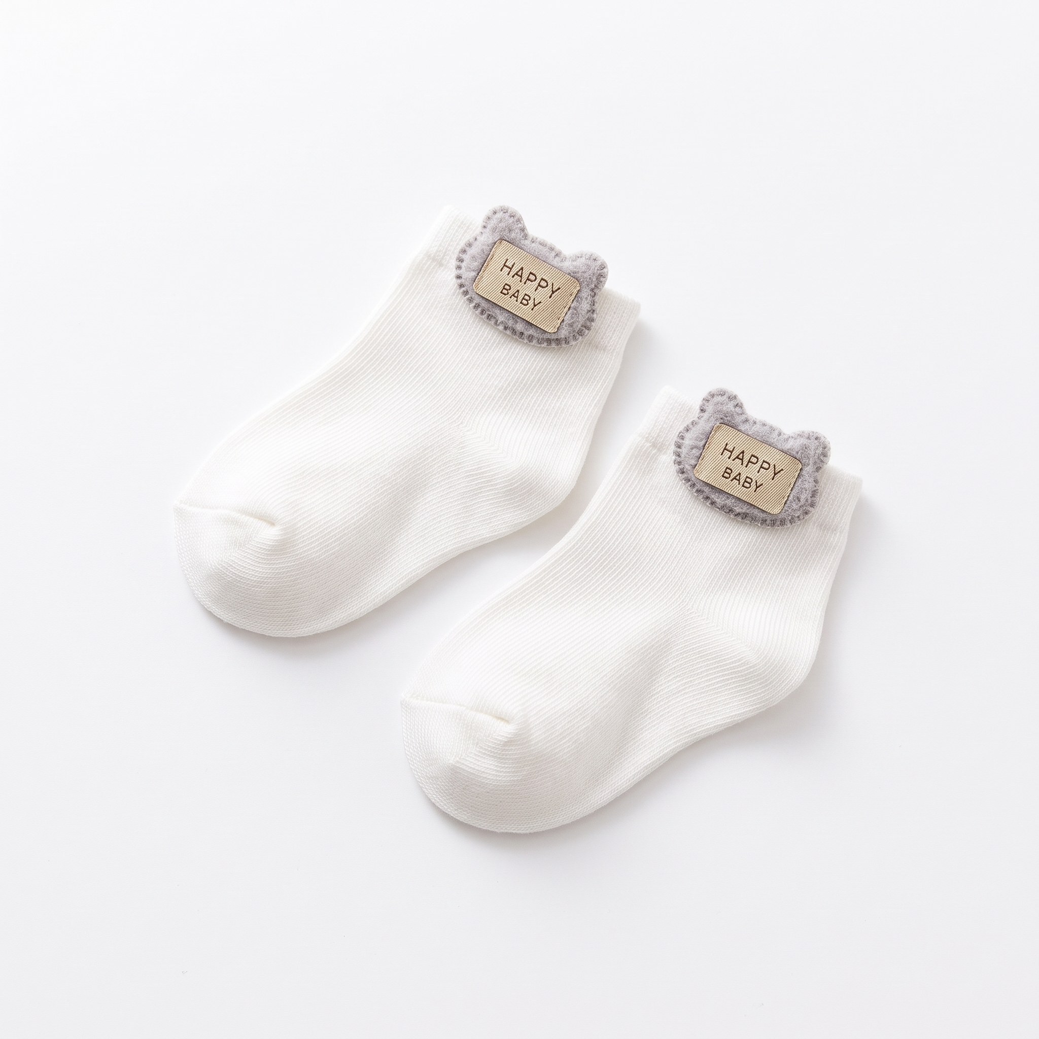White_baby_socks_photographed_2K_20261012214329