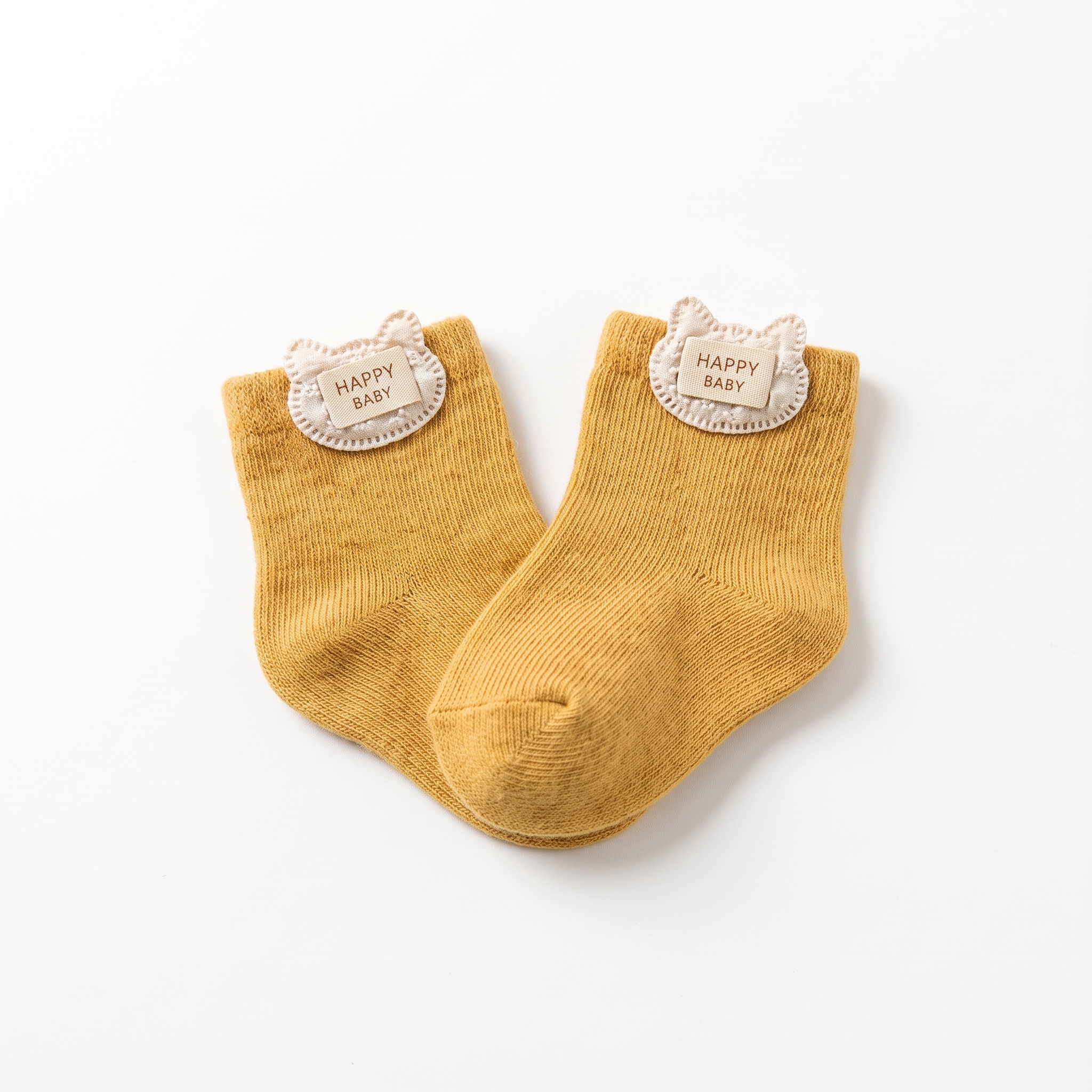 Yellow_baby_socks_displayed_2K_20261012214325